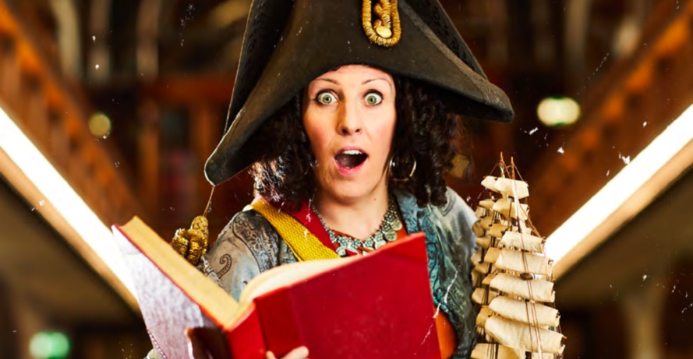 Pirate reading a book looking shocked.